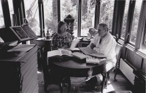 Nicolas and Frances McDowall examining a finished book